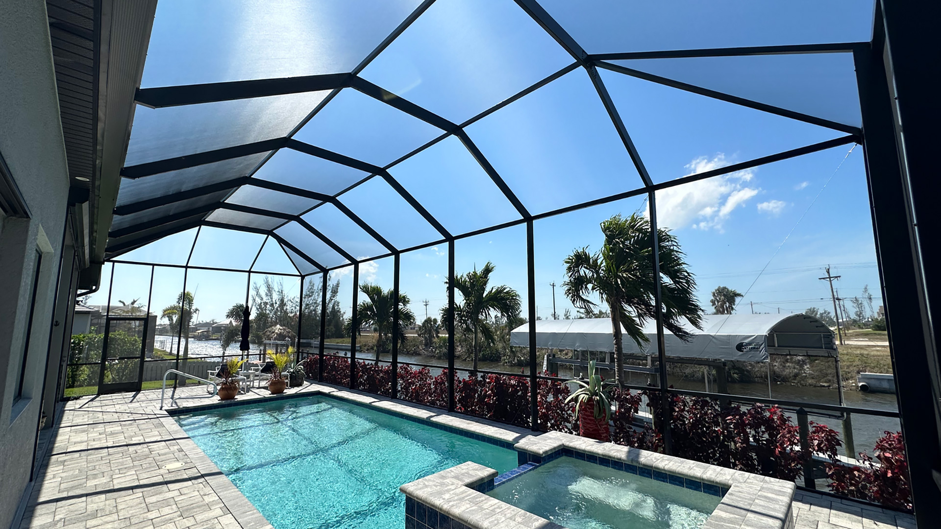 A patio enclosure with crystal clear screens